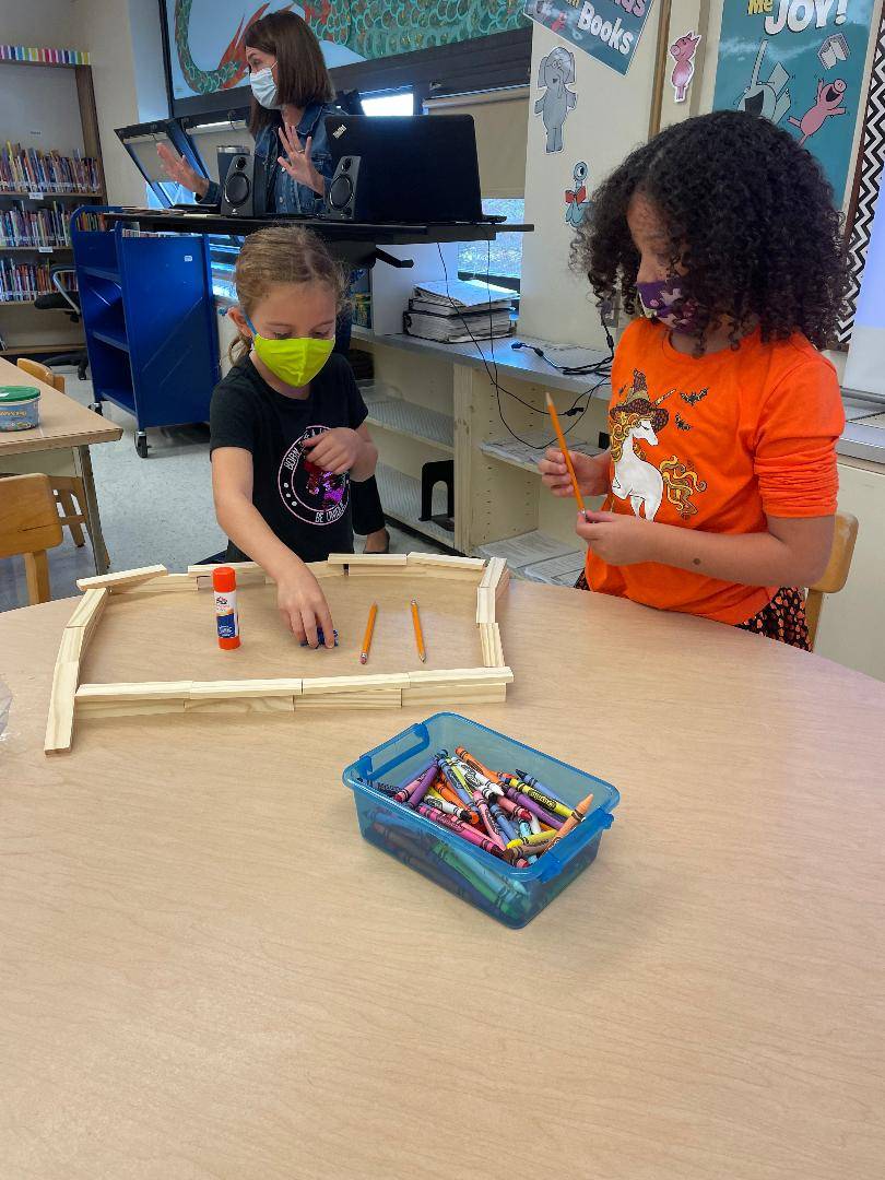 Students participating in Library STEM project