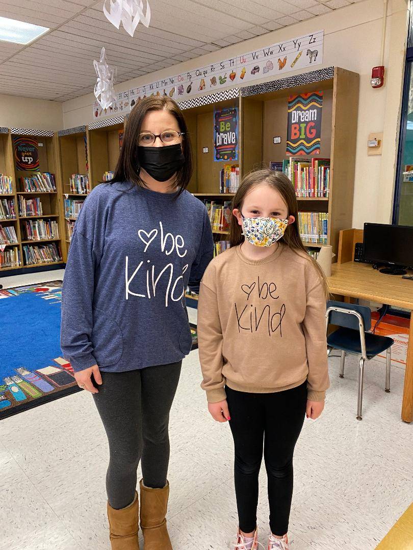 Mrs. Shaffer and student wearing matching Be Kind shirts