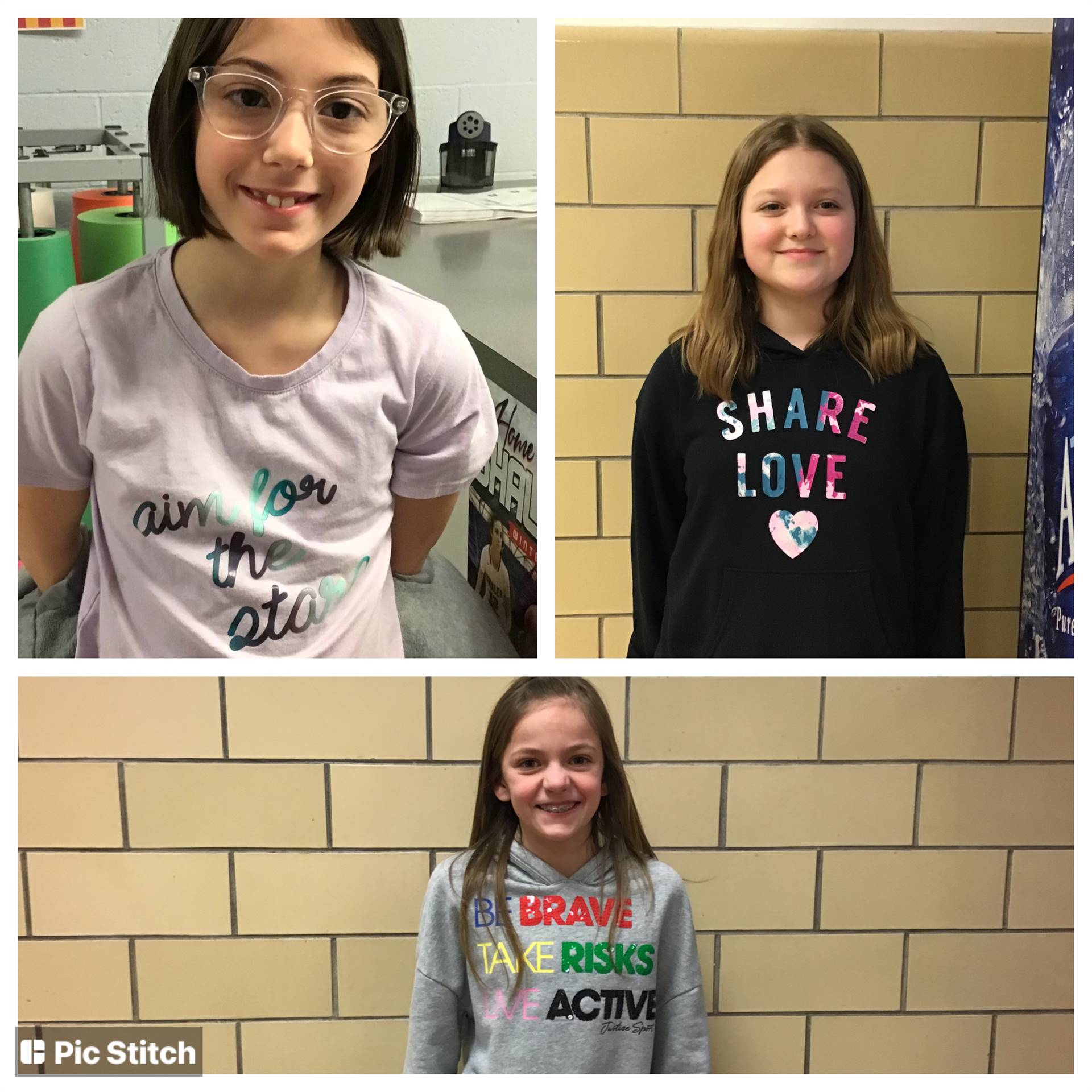 Students wearing positive saying shirts