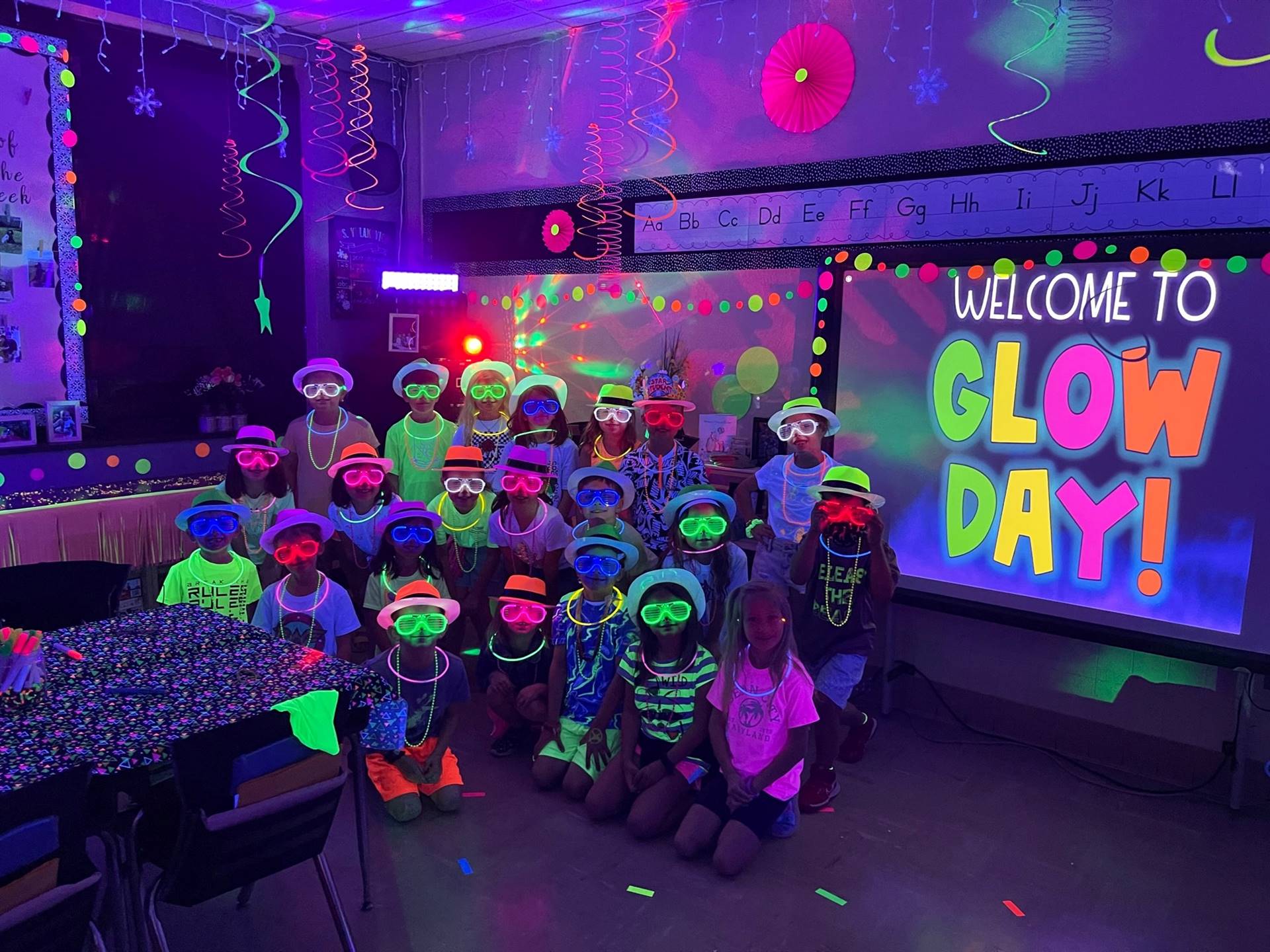 1C and Ms. Vulakovich celebrate learning with "Glow Day"