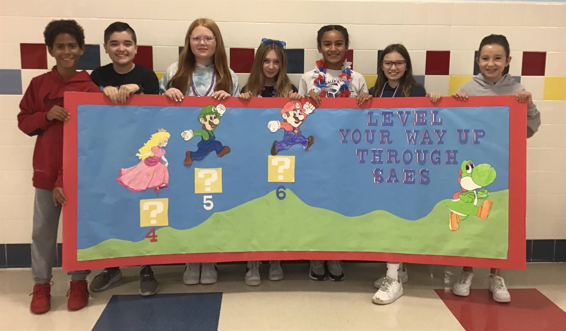 6th Graders Who Made the Homecoming Banner
