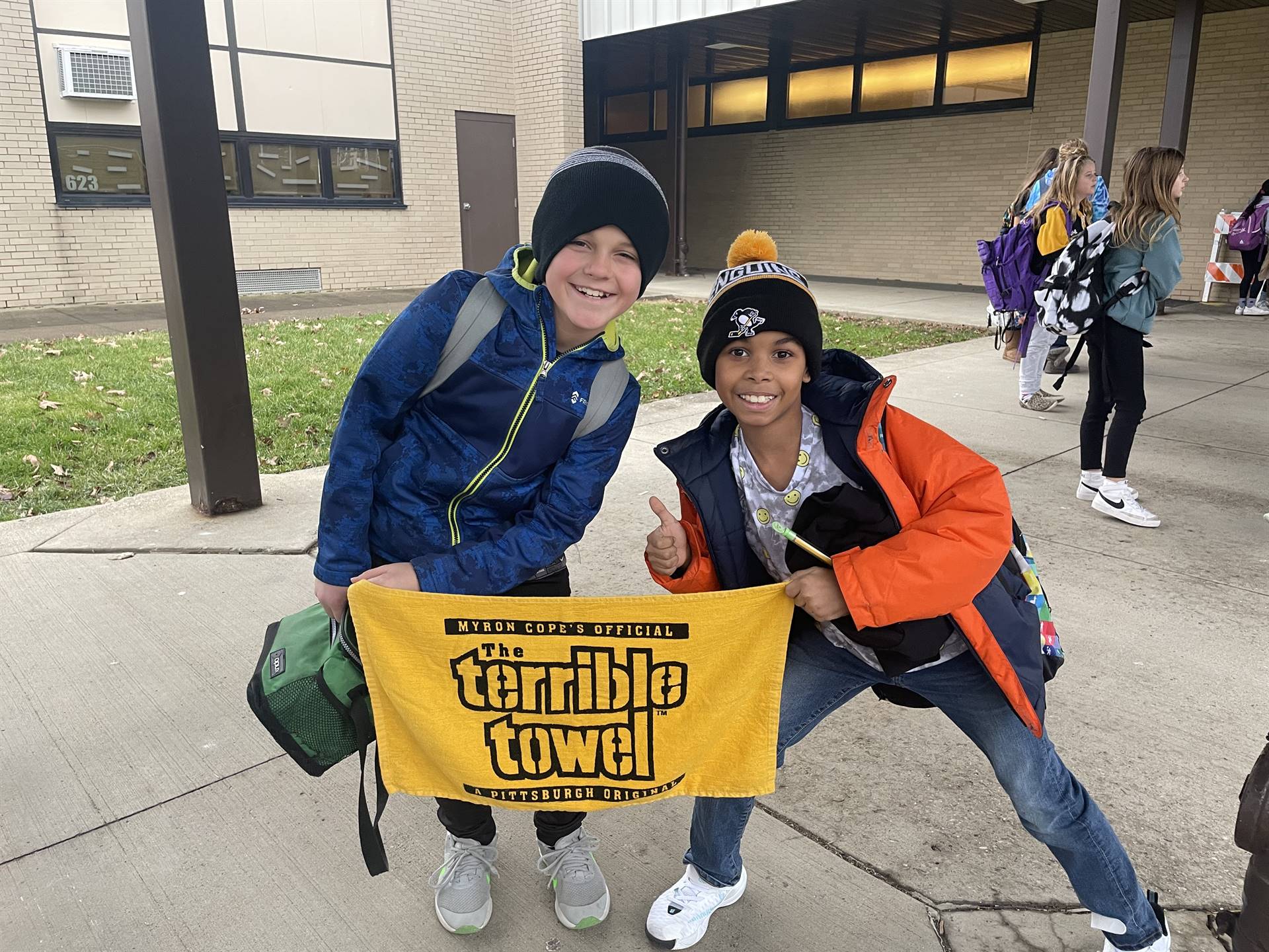 Two kids with terrible towel 