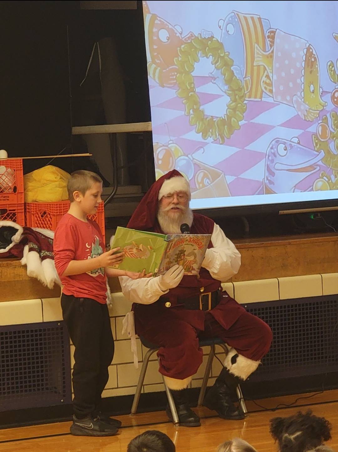 Wyatt Golacinski (2A) reading with Santa 