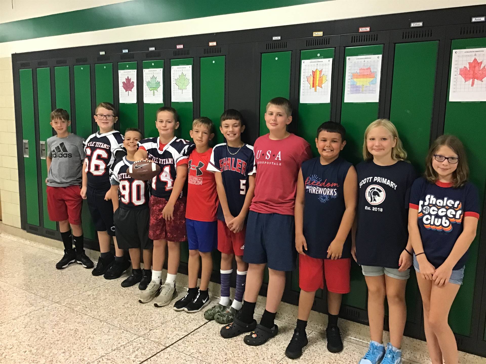 Students wearing red, white and blue