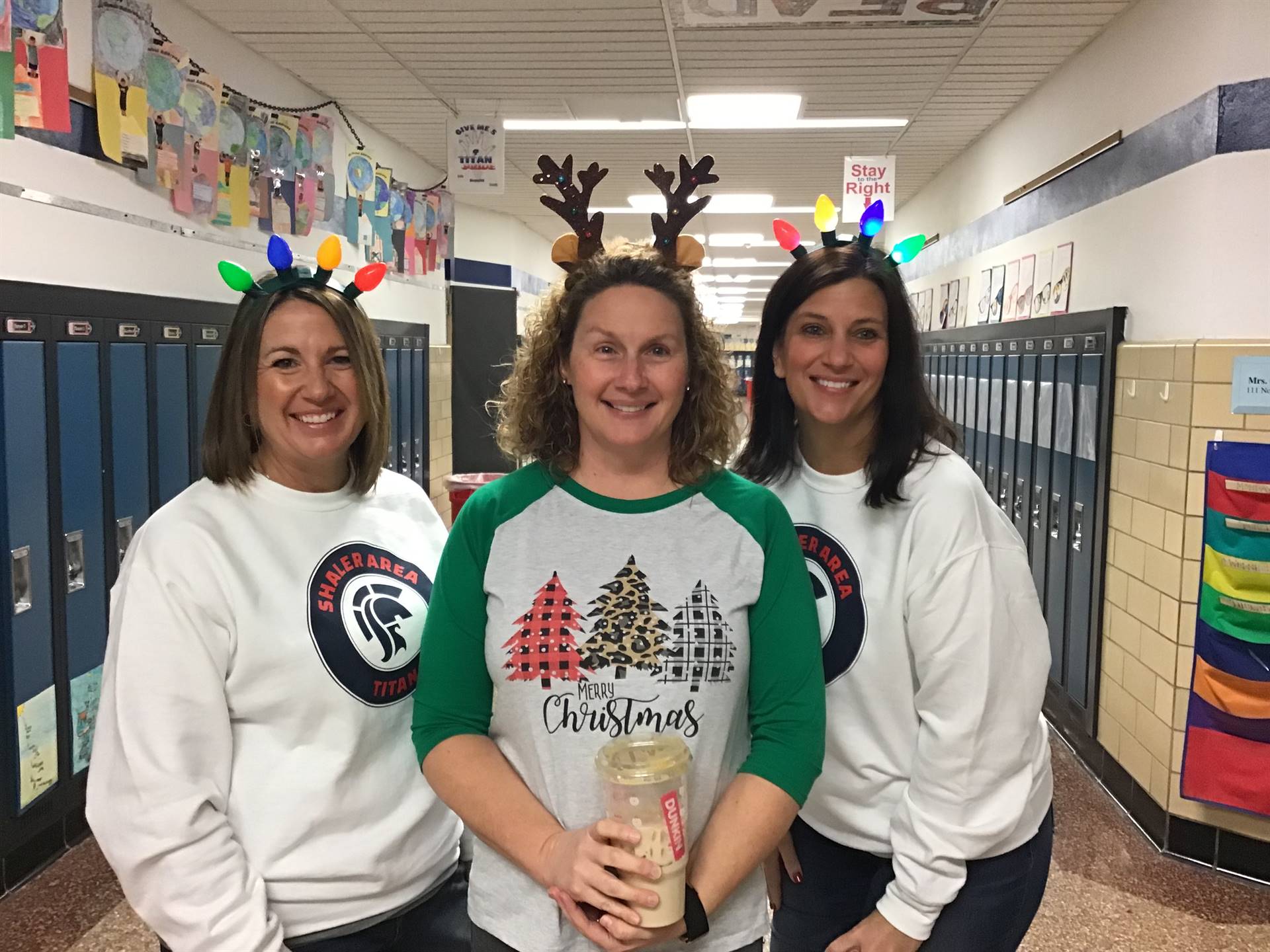 3 teachers displaying holiday spirit